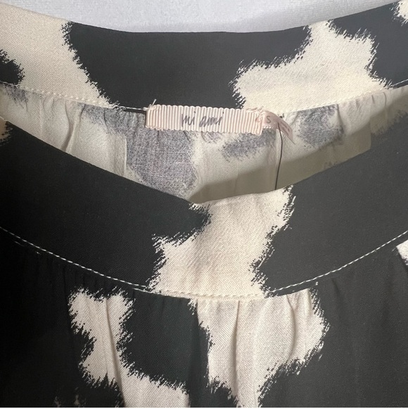 NWT Francesca’s Lilian Cow-print Blouse Size Small Black &White short sleeve Top - Picture 6 of 11